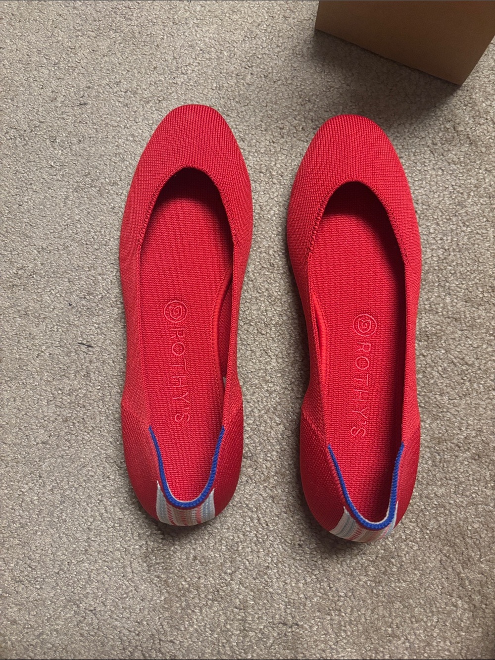 Rothy's Red Knit Ballet Flats with Multicolor Heel Stripe
